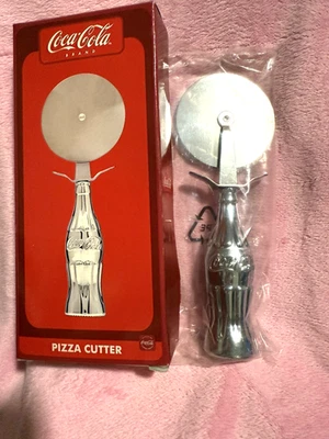 Coca-Cola Pizza Cutter Shaped like a Coke Bottle Stainless Steel Cut Blade 7.5 - Image 1 of 2