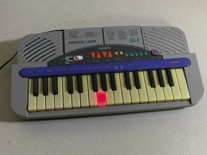 Vintage Casio Magical Light ML-2 Keyboard 32 Keys - Works & Lights Up - Picture 1 of 11