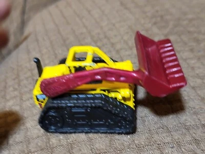 Matchbox Mini Dozer Skidsteer, #917 Yellow, loose, 1/64 C130B - Image 1 of 4