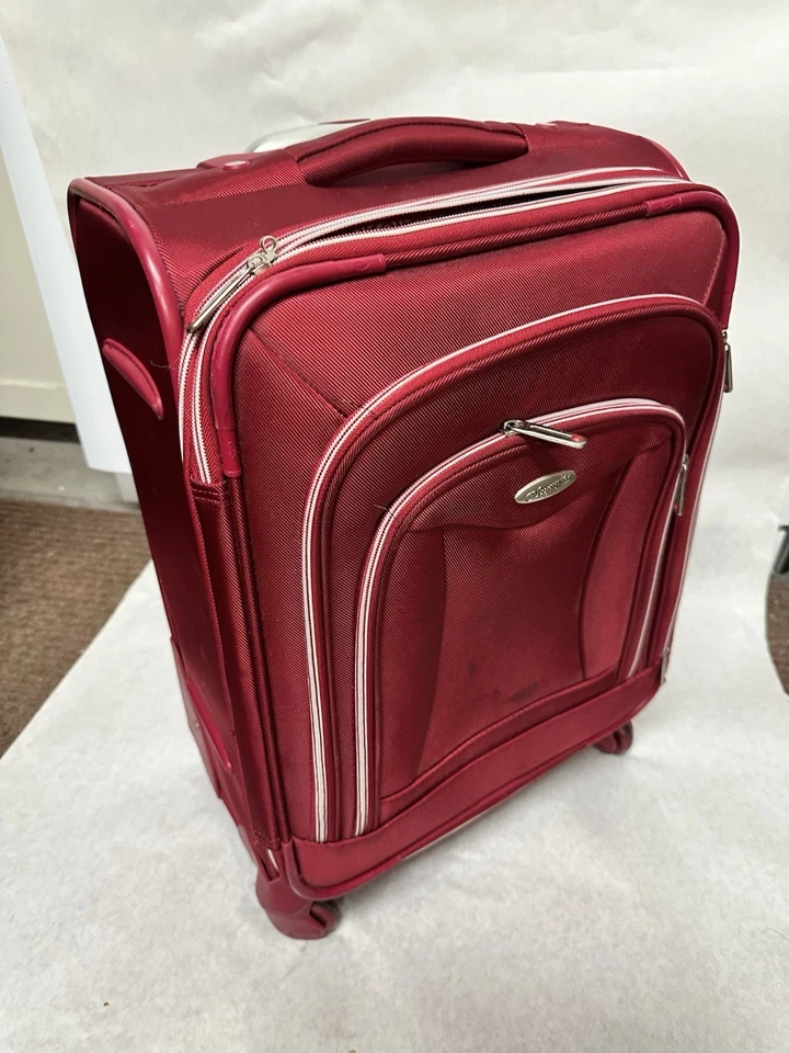 OLYMPIA U.S.A Expandable 4 Wheel Suitcase 2 Front Zipper Pockets Red 21x10x14 - Image 1 of 4