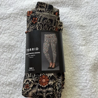 Torrid Premium Printed Legging Sz 1 Full Length Inseam 28” Black w Tan & Orange - Image 1 of 4