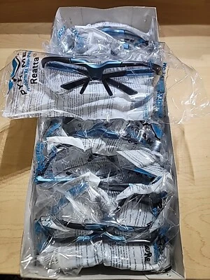 12 gafas de seguridad Pyramex Reatta con marco carbón/azul y lente antiniebla transparente Foto 1 de 4