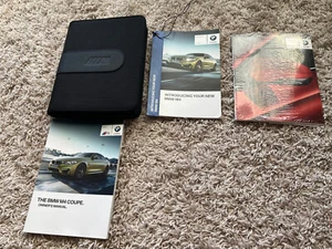 BMW Exclusive M4 Coupe 2016 16 OEM Werksbesitzer Bedienungsanleitung + Ledertasche - Bild 1 von 7