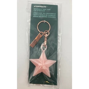 Starbucks 2023 Rosa Navidad Taza Caliente Tapa Tapón Reutilizable Estrella Llavero Nuevo en Paquete - Imagen 1 de 4