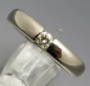 DISEÑO MADURO - ELEGANTE ANILLO DE TENSIÓN BRILLANTE - 750 DORADO - Imagen 1 de 5
