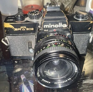 Minolta SRT 202 Black 35mm camera  working  - Picture 1 of 2