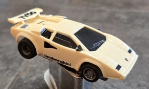 VINTAGE TYCO LAMBORGHINI COUNTACH HO SLOT CAR W CHASSIS OFF WHITE RUNS  - Picture 1 of 8