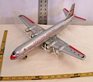 AMERICAN AIRLINES LOCKHEED L-188 ELECTRA 4 ENGINE AIRPLANE BATTERY TIN TOY - Picture 1 of 6
