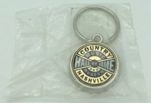 Llavero con tapa de botella del Museo de la Música Country del Salón de la Fama de Nashville - Imagen 1 de 2