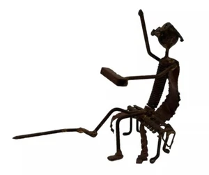 Brutalista scultura rustica in metallo supereroe??? - Foto 1 di 6