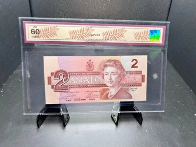 1986 Canada $2 Bank Note Graded UNC 60 SN# AUG3990609 Changeover Note - Image 1 of 4