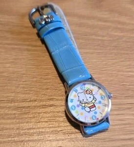 Reloj Hello Kitty Azul Lunares Sanrio Cuarzo Rosa Arco Dije 2004 Japón W1 - Imagen 1 de 18