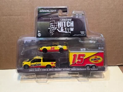 1/64 GREENLIGHT HITCH & TOW 2015 FORD F-150 & 2012 SHELBY GT500 ENCLOSED HAULER - Image 1 of 4