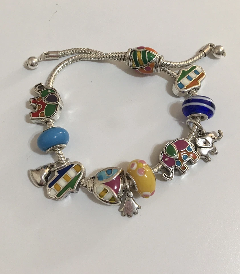 Pulsera serpiente ornamental vintage  Esmalte deslizante europeo Dije Elefante�� Mano Foto 1 de 4