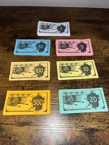 Monopoly Spiderman Money (24)$500 (23)$100 (23)$50(48)$20 (39)$10 (40)$5(40)$1 - Picture 1 of 1