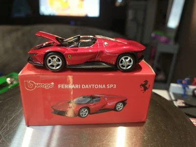 Bburago 1/64 RED FERRARI DAYTONA SP3. WITH OPENING HOOD AND RUBBER TIRES - Image 1 of 4