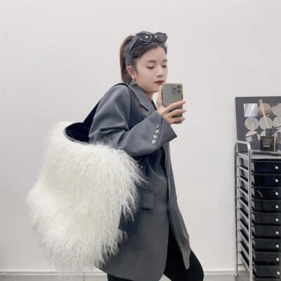 Bolso de mano de piel de cordero genuino real para mujer Bolso de piel de mongol Bolso largo de piel de lana Foto 1 de 4