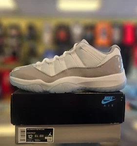 AIR JORDAN 11 RETRO LOW "CEMENT GREY" 2023 SZ 12 / 13.5 (W) AV2187-140 DS White - Picture 1 of 9