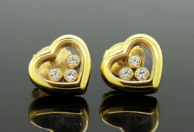 Aretes de corazón de oro amarillo de 18 k con diamantes felices flotantes Chopard Foto 1 de 4