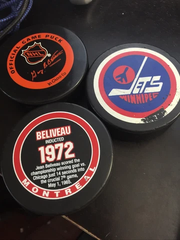 NHL souvenir pucks, lot of 3 Cover