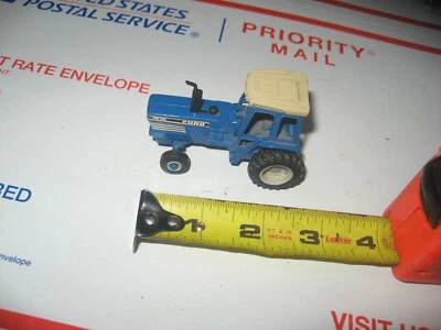 FORD TOY TRACTOR TW35 1/64TH SCALE - Image 1 of 3