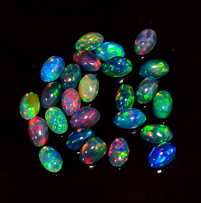 Lote de 25 cabujones naturales negros ópalo etíope forma ovalada 5,00 quilates 5x3x2 mm Foto 1 de 3