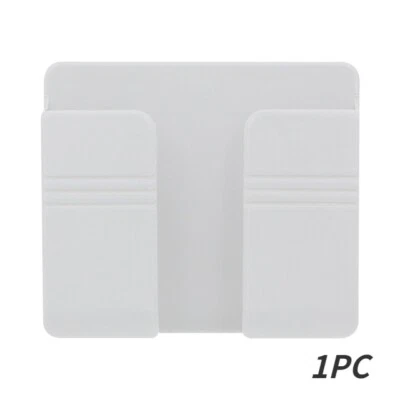 Soporte de pared para teléfono inteligente 1/2/4 piezas control remoto teléfono celular montaje autoadhesivo Foto 1 de 4