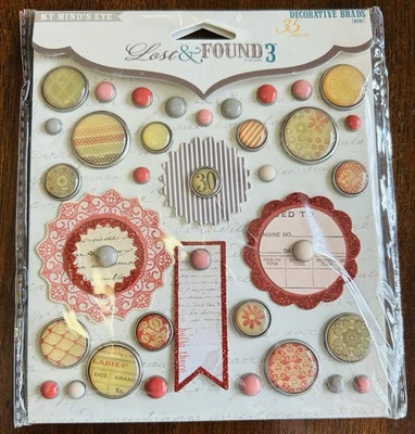 My Mind's Eye Lost & Found 3 adornos decorativos "Rubí" para álbumes de recortes Foto 1 de 2