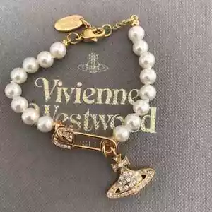 Vivienne Westwood White Pearl Safety Pin Clip Charm Gold Bracelet - Picture 1 of 4