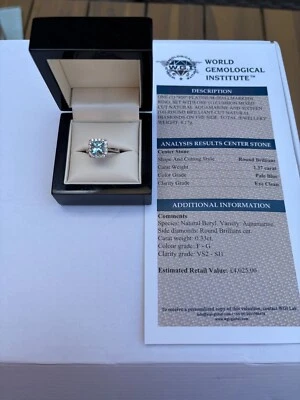 Platinum 1.37cts Natural Aquamarine & 0.33ct Diamond Halo Cluster Ring - Image 1 of 4