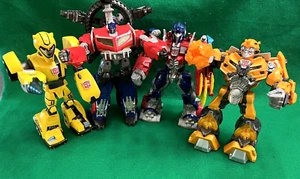 Lot of Four Transformers - Two Optimus Prime and Two Bumblebee - Loose - Picture 1 of 17