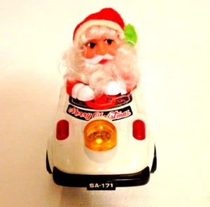 Vtg. Santa Claus Car Spinning Bump & Go Toy Flashing Lights Sound Free Roaming - Picture 1 of 9