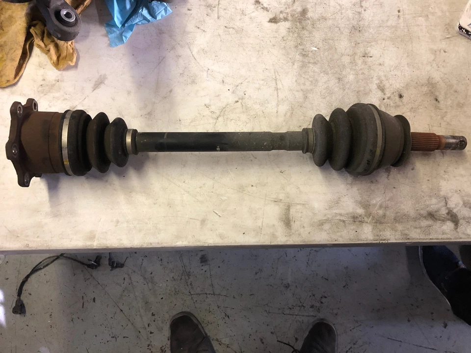 2003-2006 INFINITI G35 SEDAN PASSENGER SIDE REAR AXLE - Image 1 of 1