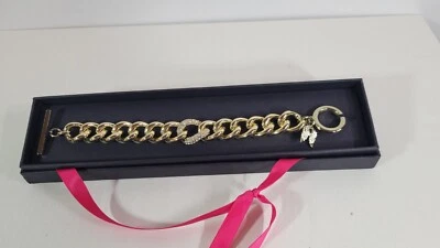 Pulsera Victoria Secret Tono Dorado Eslabón Palanca Alas de Ángel Dije Acento Cristal Foto 1 de 2