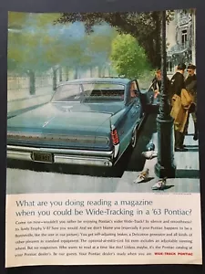1963 Wide-Track Pontiac Ad What are you doing reading instead of Wide-Tracking - Picture 1 of 1