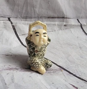 Vintage japanische Harz Netsuk Buddha lehnt sich auf einen Eimer Figur - Bild 1 von 7