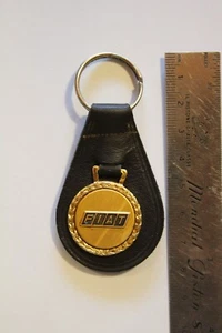 Schlüsselanhänger Fiat Autozubehör Epoche 80er Jahre Händler Carignano Carmagnala - Bild 1 von 3