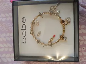BEBE jewelry Set 2 pc Charm Bracelet Earrings Set Boxed Fashion Jewelry NIB Gold - Picture 1 of 2