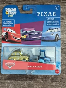 NEW PIXAR FEST 2021 LUIGI & GUIDO PIXAR FEST DIECAST VEHICLE 2021NEW ON CARD - Picture 1 of 2
