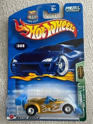 Hot Wheels Treasure Hunt Riley & Scott MK III 2003 dorado con pilotos reales Foto 1 de 3