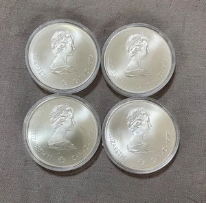 Vierergruppe 1976 Elizabeth II Montreal Olympiade 1oz Silber Gedenkmünzen - Bild 1 von 9
