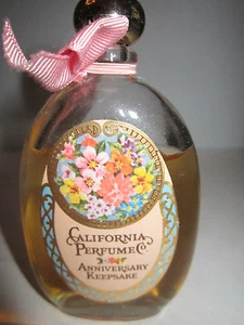 VINTAGE CALIFORNIA PERFUME ANNIVERSARY BOTTLE IN THE BOX - BY AVON - 85% FULL - Picture 1 of 2