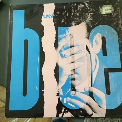 ELVIS COSTELLO & THE ATTRACTIONS ALMOST BLUE 12” VINYL LP - Image 1 of 4