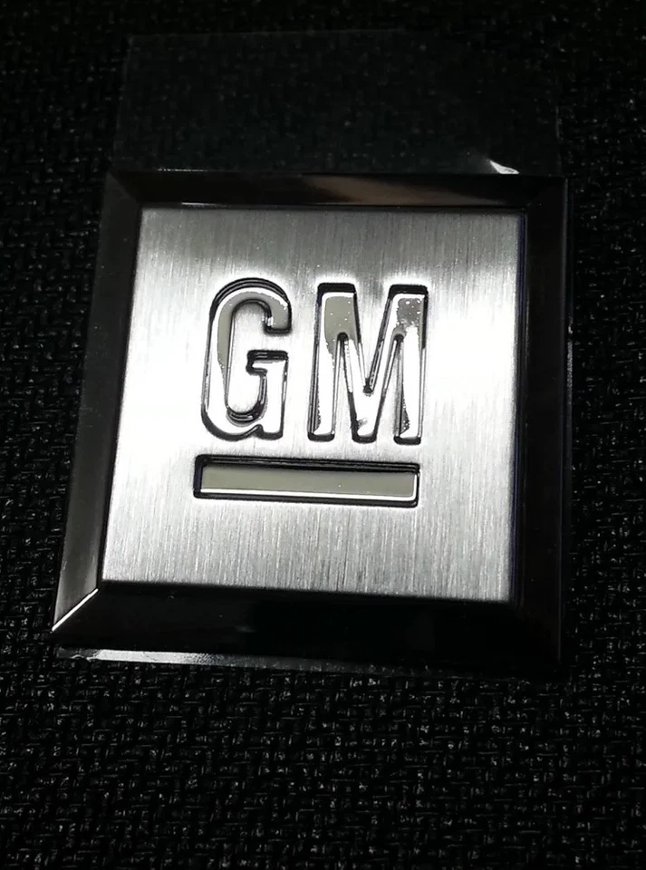 OEM USED GM Mark Of Excellence Emblem PONTIAC CHEVY BUICK GMC CADILLAC Used - Image 1 of 1