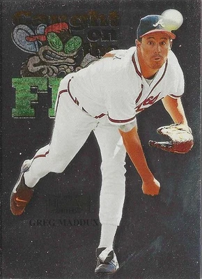 1999 Skybox Metal Universe - Caught on the Fly Greg Maddux #243 - Image 1 of 2