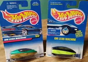 Hot Wheels GM Lean Machine Neongelb mit Schwarz & Gold mit Grün 1:64 Neu 2 Stück - Bild 1 von 13