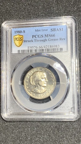 1980-S 1$ Mint Error SBA MS66 Struck Through Grease Rev Rare Coin Cover