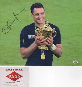 DAN CARTER LEGENDARY ALL BLACKS STAR SIGNED WORLD CUP VICTORY PHOTO PAAS - Picture 1 of 1