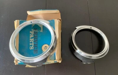 NEW AND USED 1961 CHEVROLET IMPALA L/R OUTTER HEADLAMP LIGHT BEZELS (42D) - Image 1 of 4