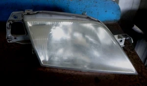 Ford Laser KN KQ 2/99-03 Right Headlight - Picture 1 of 3
